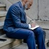 man writing journal reflection Masonic education