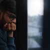 man sitting alone thinking window Masonic education