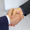 two men handshake outdoor light Masonic education