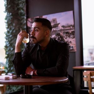 man sitting alone thinking window Masonic education