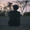 man sitting quietly reflecting outdoors Masonic education