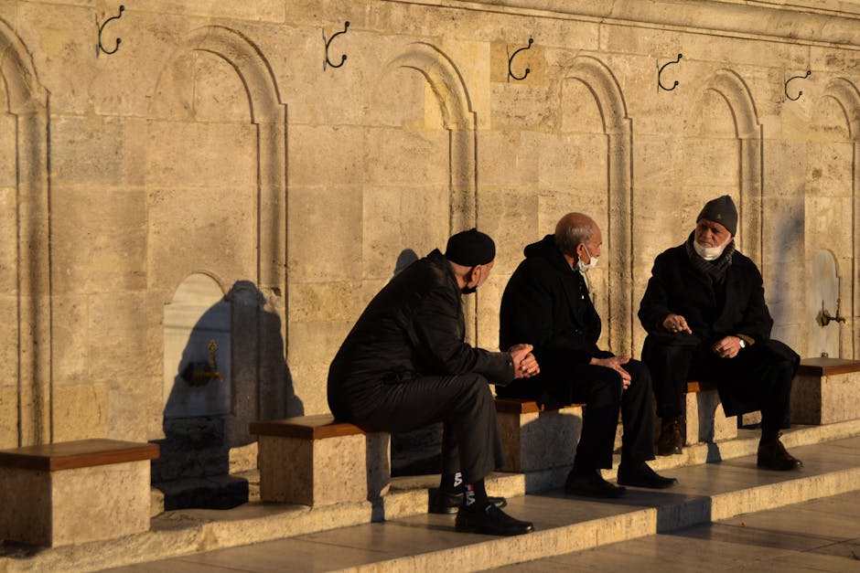 two men talking park bench Masonic education
