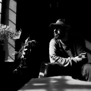 man sitting quietly window light Masonic education