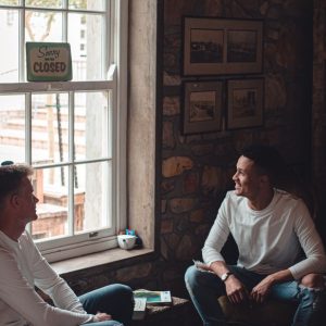two men sitting talking outdoors Masonic education