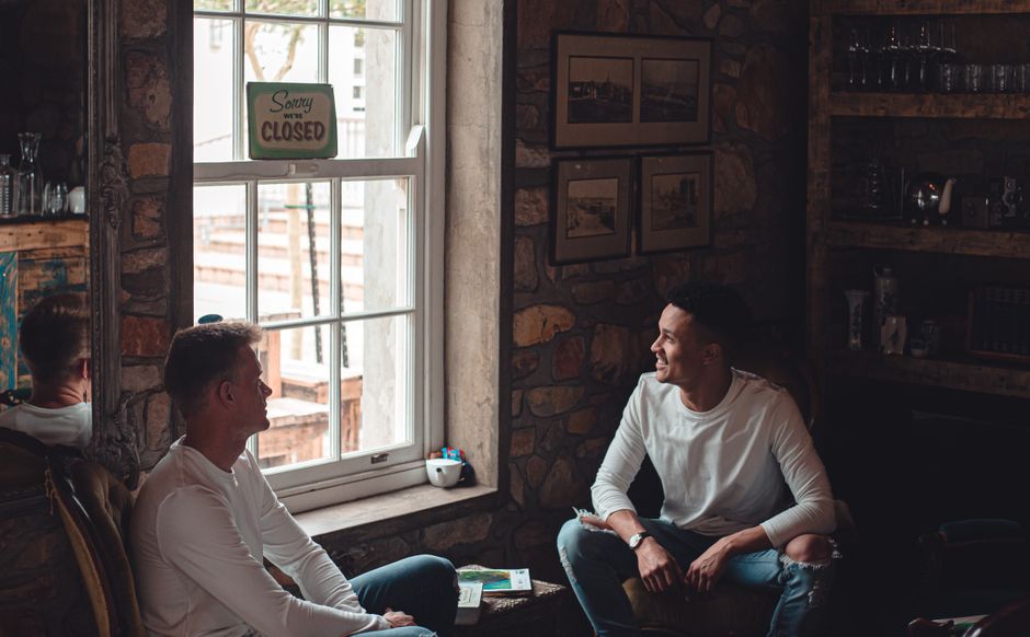 two men sitting talking outdoors Masonic education