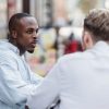 two men talking seriously outdoors Masonic education