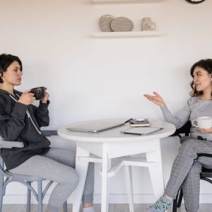 friends talking coffee table Masonic education