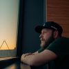 man sitting alone window thinking Masonic education
