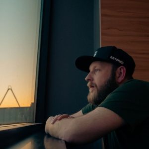 man sitting alone window thinking Masonic education