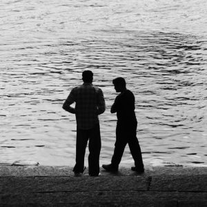 two men talking front porch Masonic education