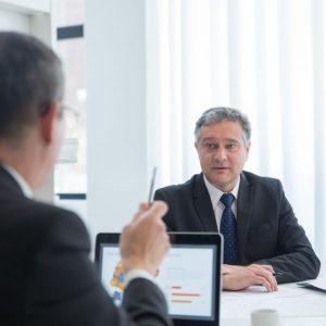 two men talking office window Masonic education