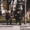 two men talking park bench Masonic education