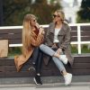 two people talking quietly park bench Masonic education