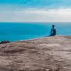 man sitting quietly overlooking water Masonic education