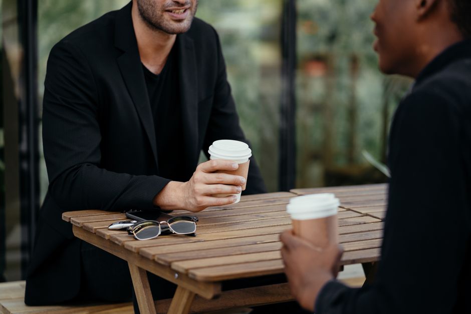 older younger men talking coffee Masonic education