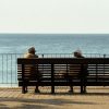 two men serious conversation bench Masonic education