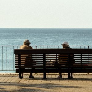 two men serious conversation bench Masonic education