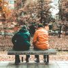 two men sitting apart park bench Masonic education